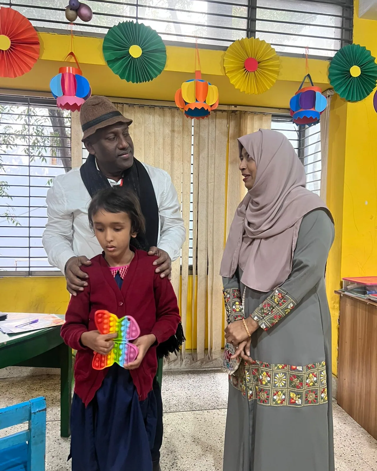 Teacher guiding a student through special education exercises